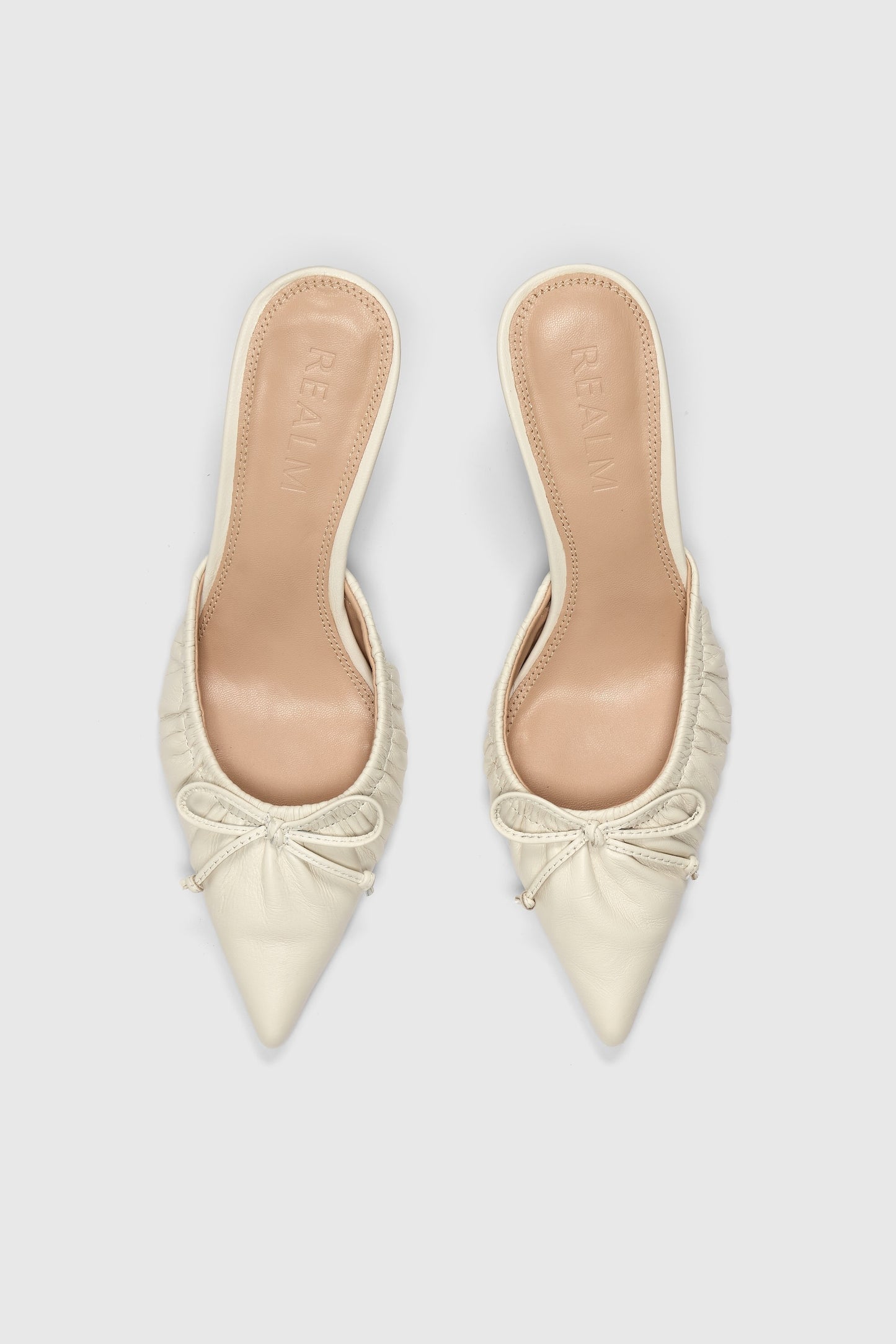 White leather pointed-toe high-heeled backless court shoes