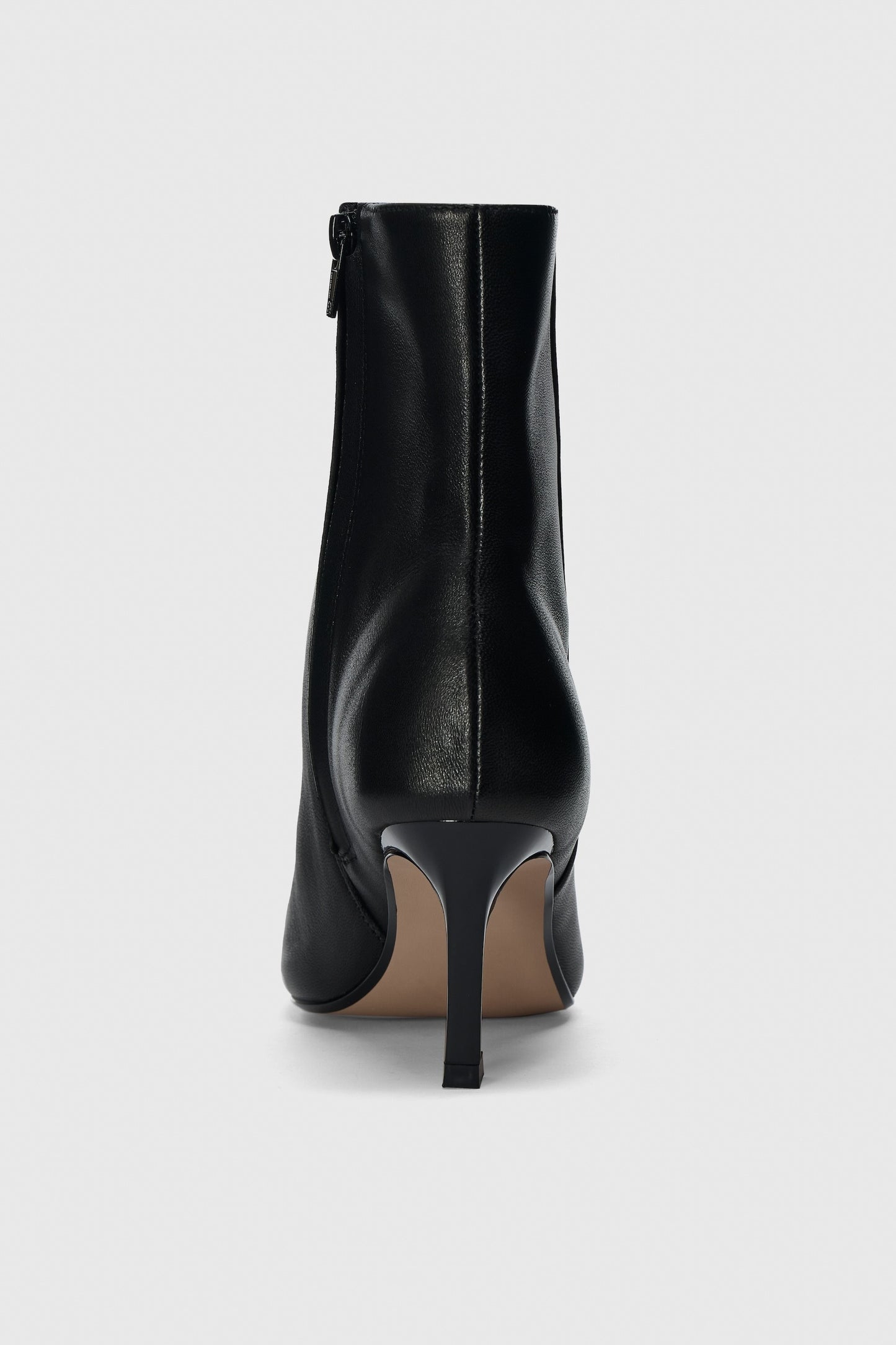 Black leather zip up ankle boots