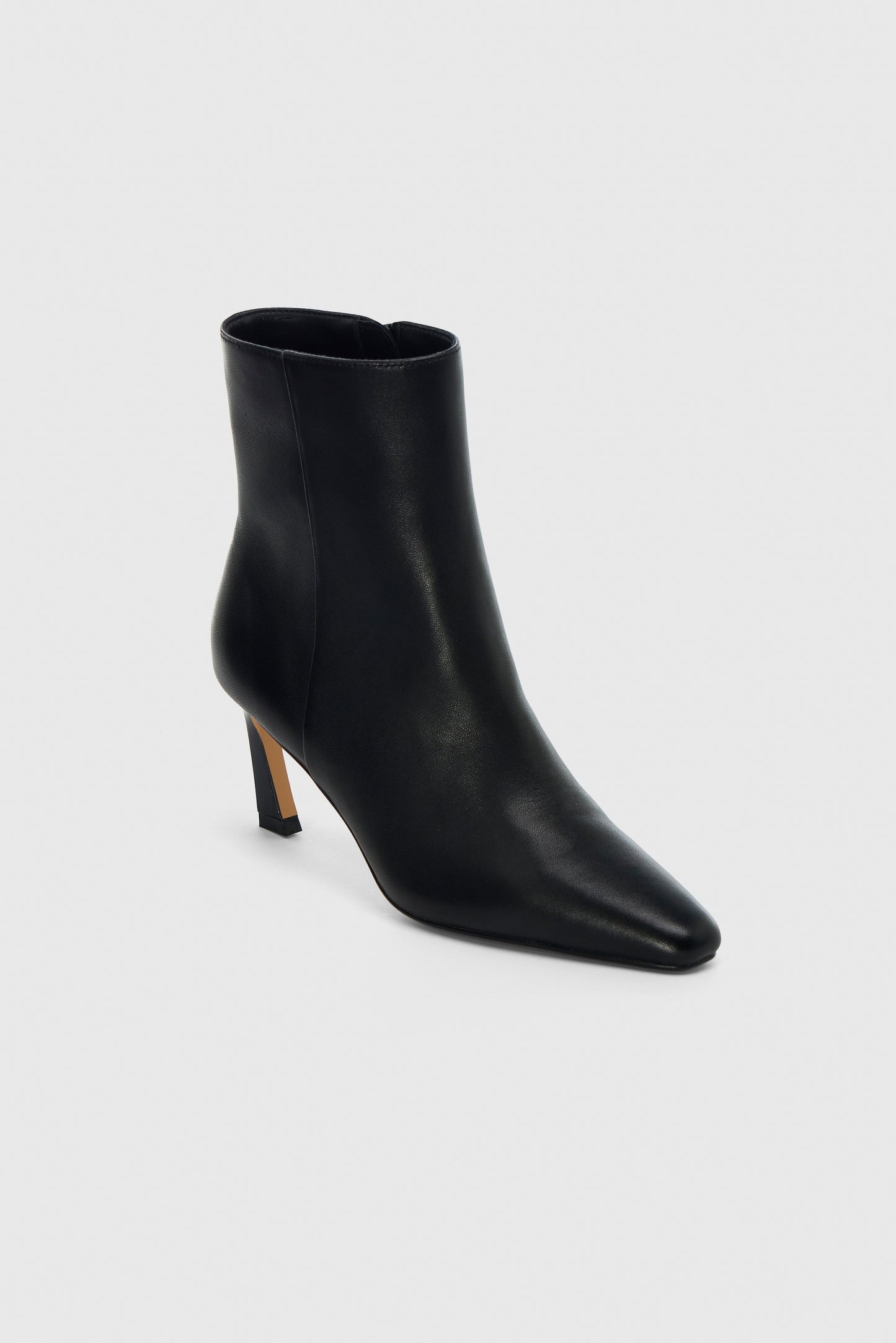 Black leather zip up ankle boots