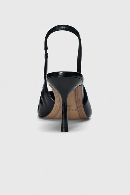 Black leather high heeled slingback shoes with pointed toe