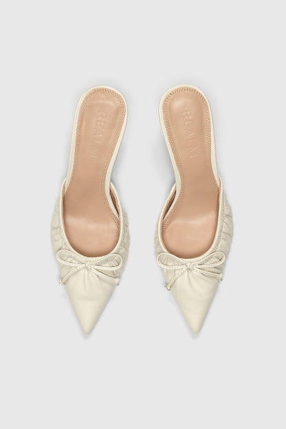 White leather pointed-toe high-heeled backless court shoes