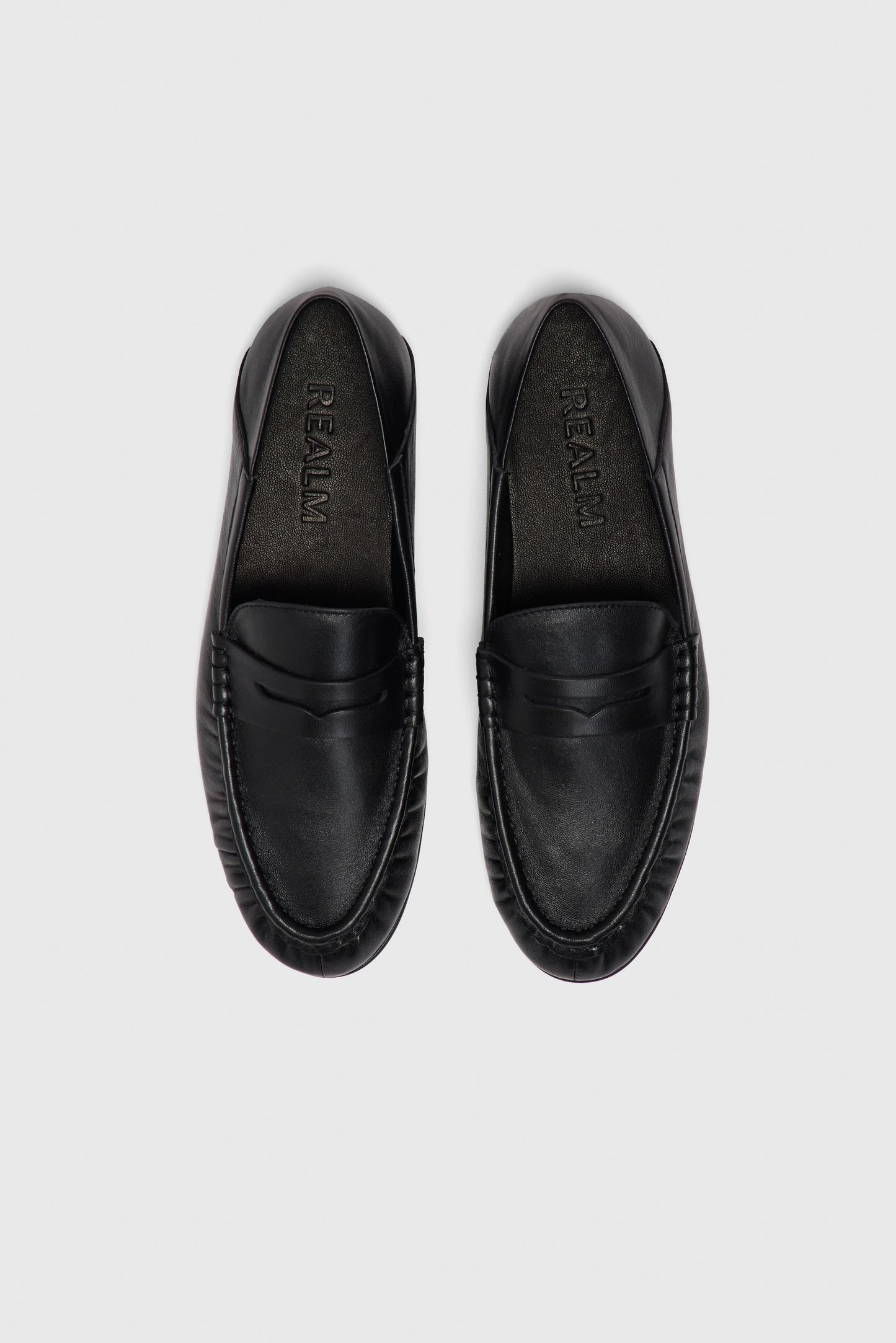 Black leather loafers
