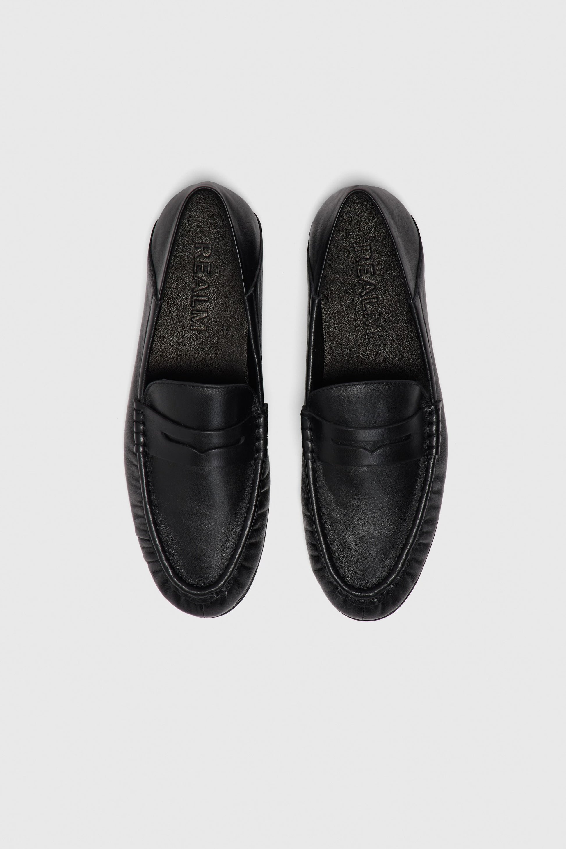 Black leather loafers