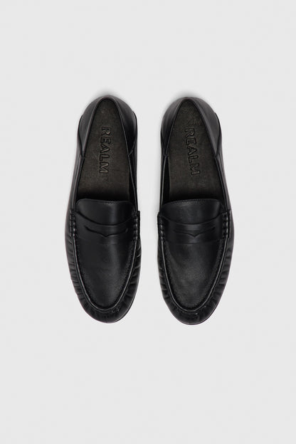 Black leather loafers