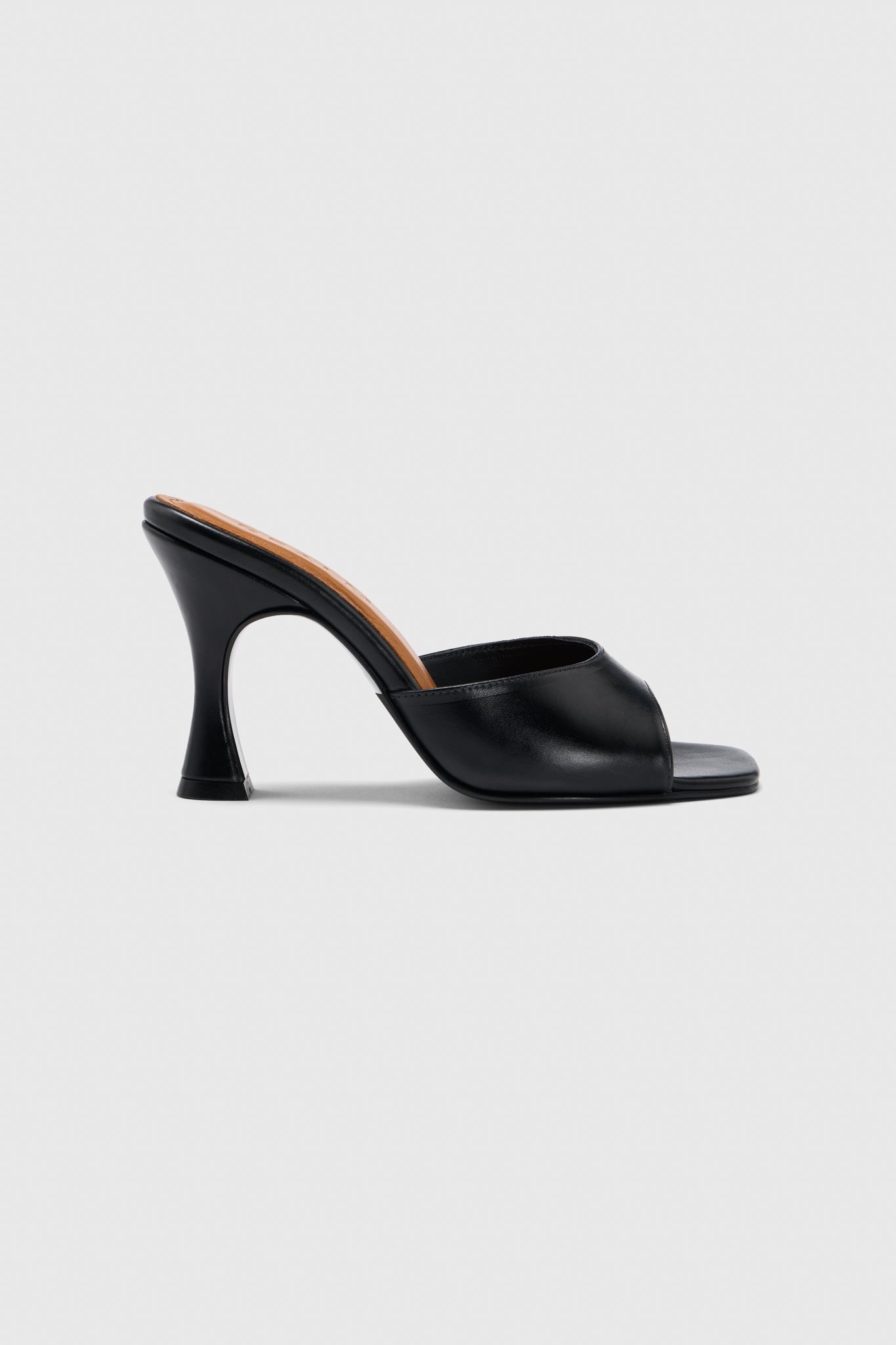 Black leather mule high heel sandals with a wide front strap and flared heel, shown in profile on a light gray background.