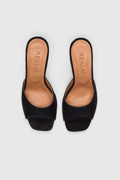 Black suede heeled 90s mules 